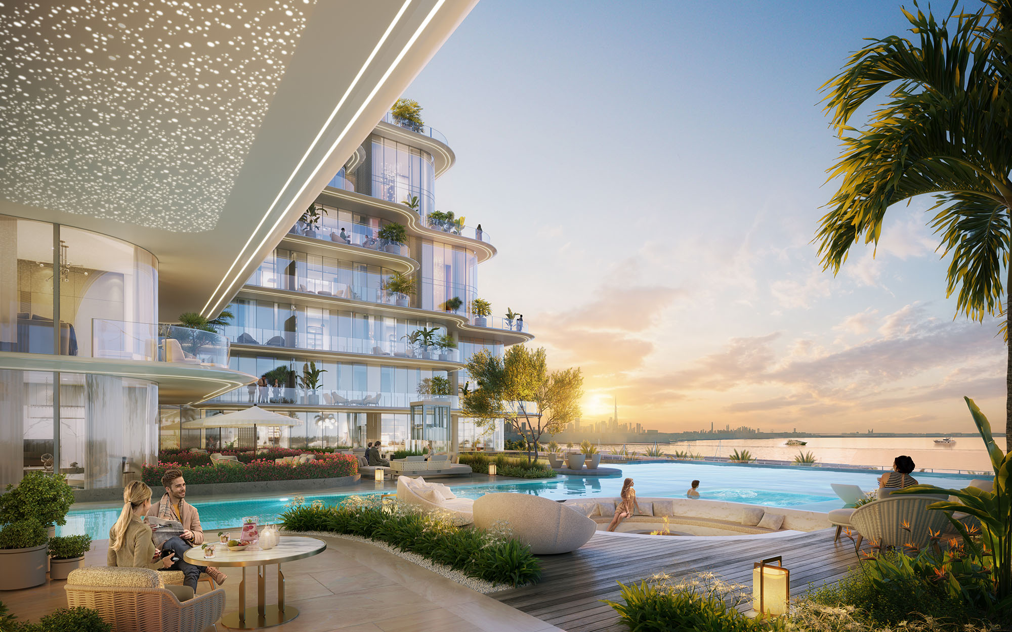 Cotier House By Imtiaz Modern poolside scene at a luxury building, with people enjoying drinks, greenery, and a sunset view.